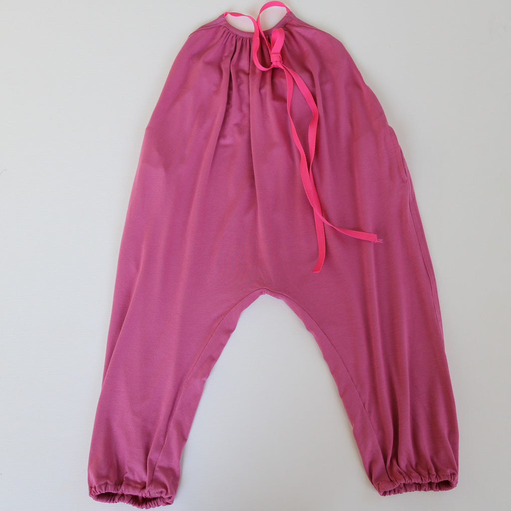 A purple Halter Neck romper by Hiccups & Buttercups