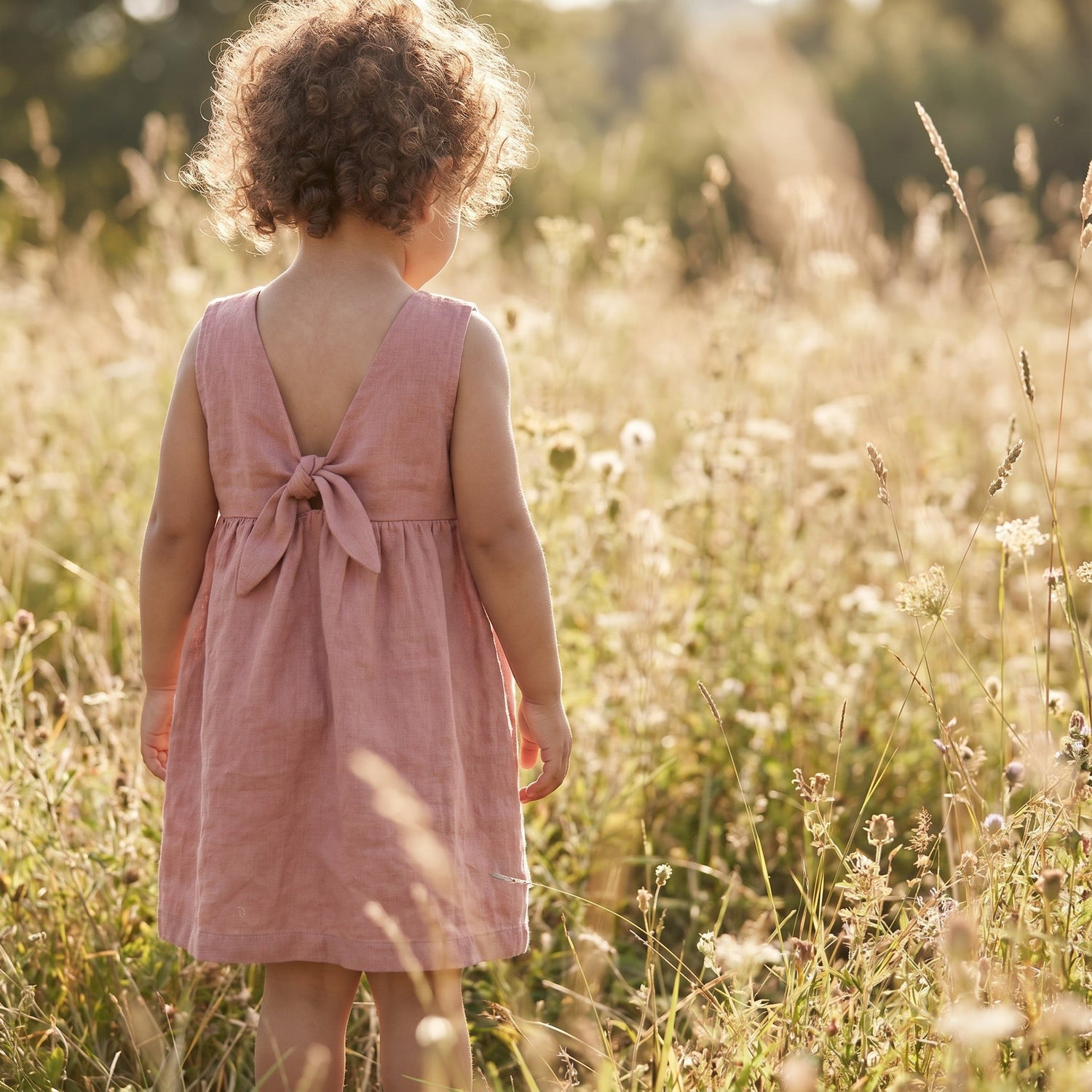 Girl wearing Hiccups & Buttercups summer dress