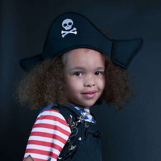 a young girl wearing a dress up Pirate Hat from Hiccups & Buttercups