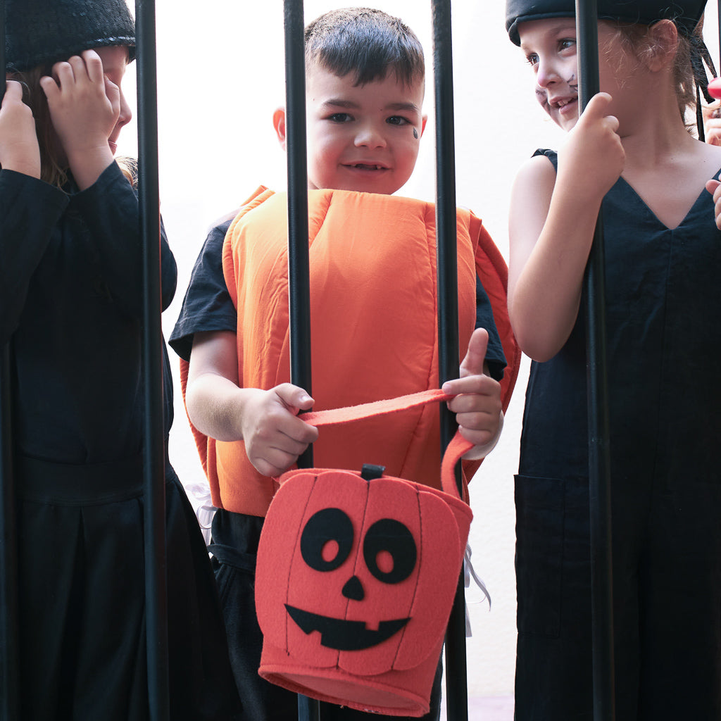 children playing in Halloween costumes by Hiccups & Buttercups