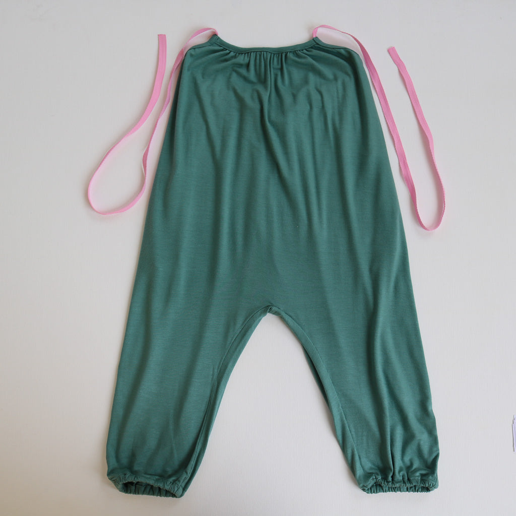 A Jade Green Halter Neck romper by Hiccups & Buttercups