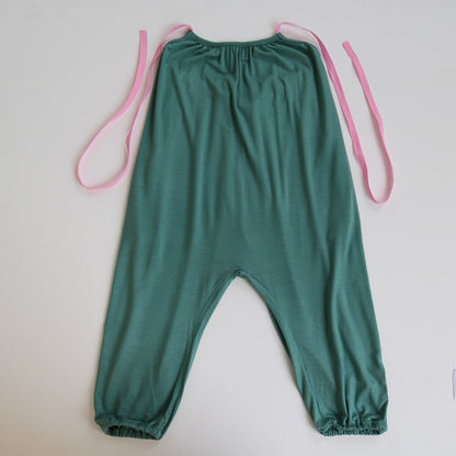 A Jade Green Halter Neck romper by Hiccups & Buttercups