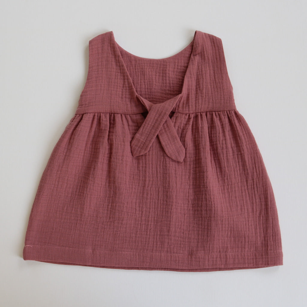 A plum summer dress in organic cotton by Hiccups and Buttercups