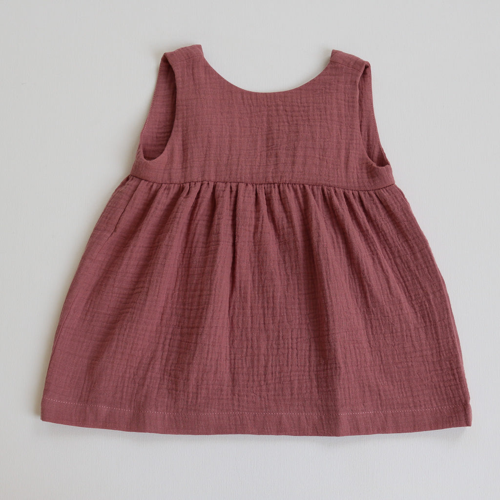 A plum summer dress in organic cotton by Hiccups and Buttercups