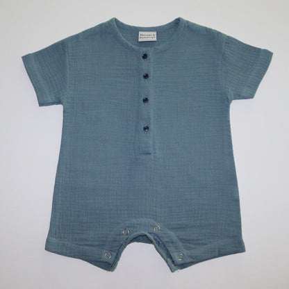 A blue short-sleeve cotton baby romper by Hiccups & Buttercups